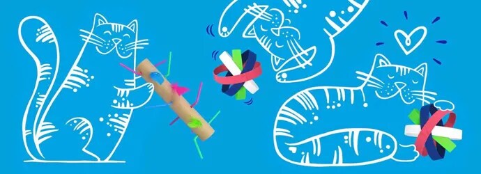Sinisellä pohjalla olevat piirretyt kissat leikkivät kotitekoisilla kissanleluilla, jotka on valmistettu värillisestä pahvista